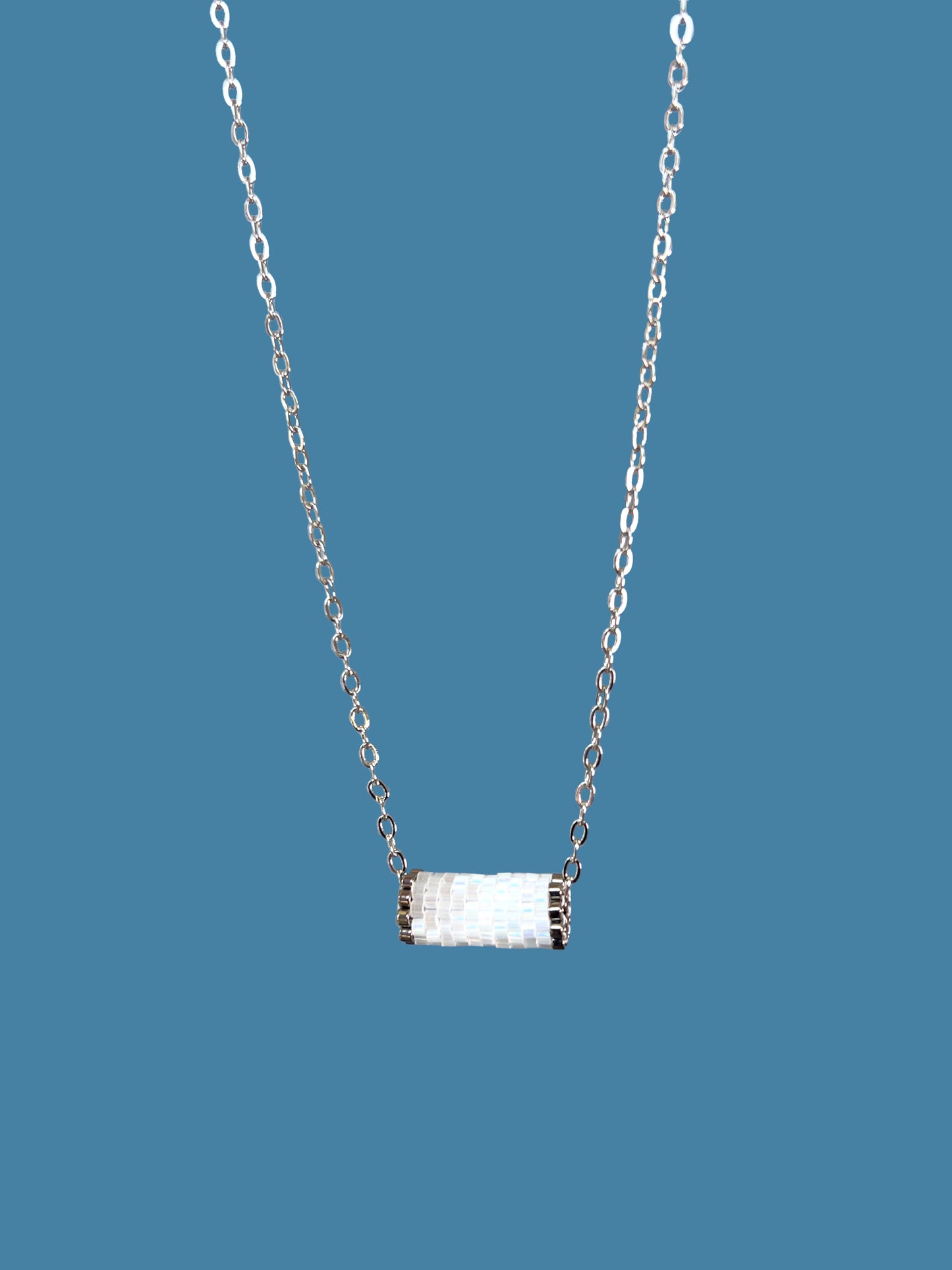 "Eira" Snowflake White Satin Tube Pendant Necklace