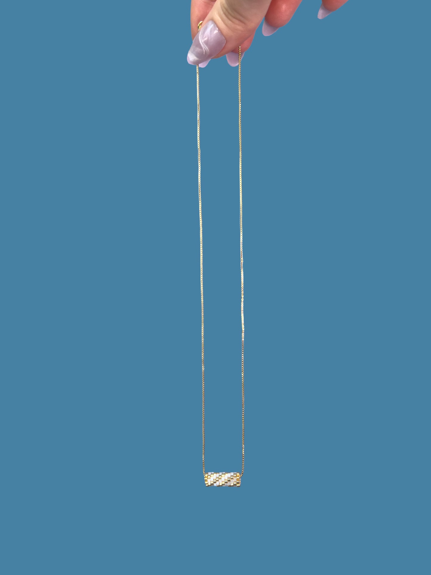"Allure" Gold and Creamy Satin Tube Diagonal Pendant Necklace