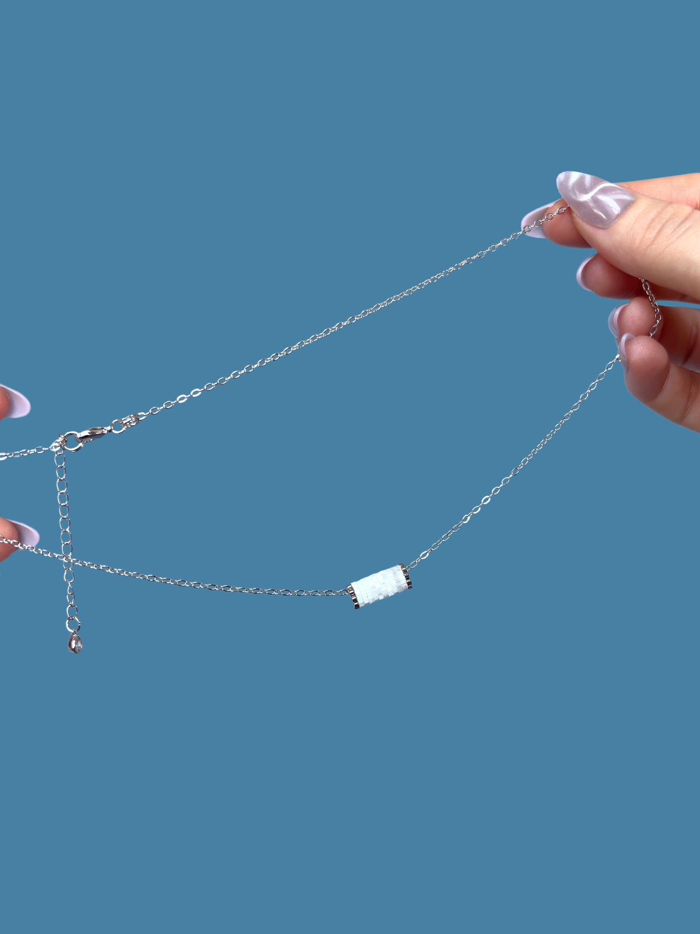 "Eira" Snowflake White Satin Tube Pendant Necklace