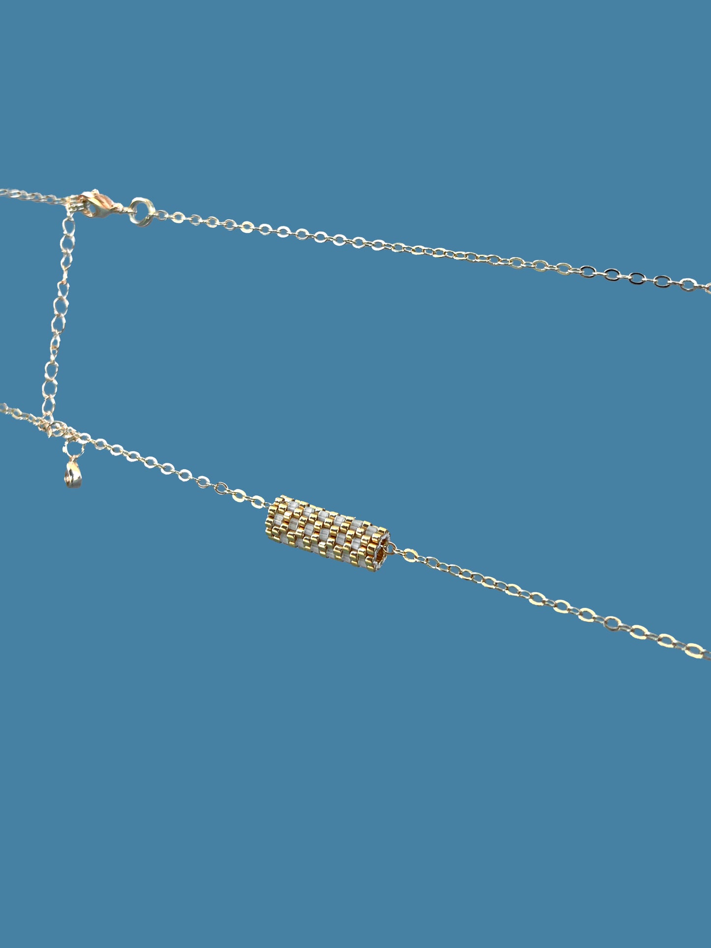 "Dahlia" Gold and Cream Satin Tube Pendant Checkers Necklace